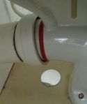 Red tape around toilet drain